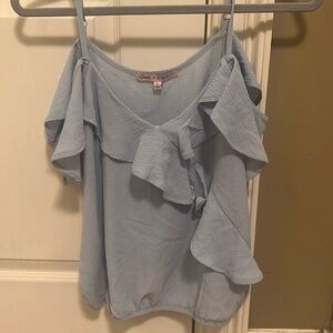 light blue off the shoulder top lined waistband at the bottom. Unworn.